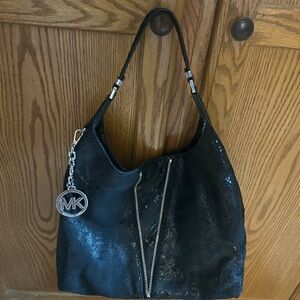Michael Kors Black Hobo Bag with Textured Leather and Silver Accents